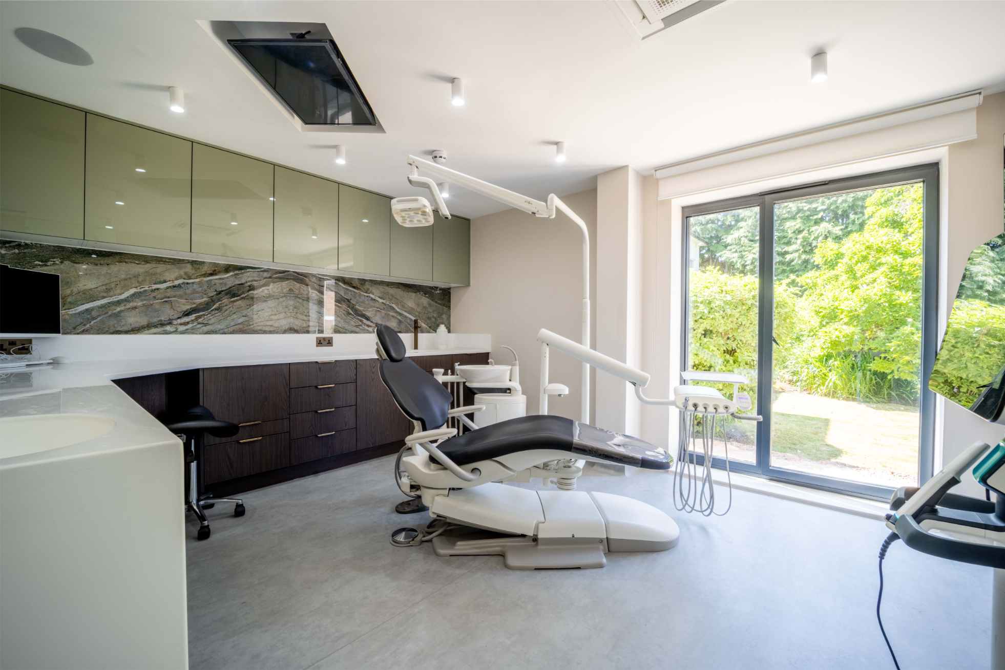 A treatment room at Treetops with a view of the garden